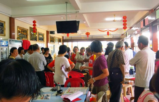 People everywhere.The air exudes a sense of art and cultural enlightenment as everyone imbibes in the beauty of calligraphy.