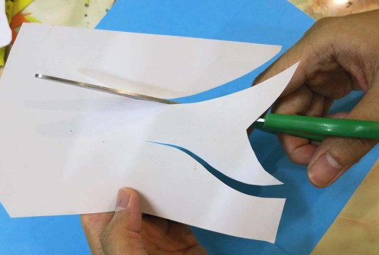 Just follow the trace and cut it deliberately.